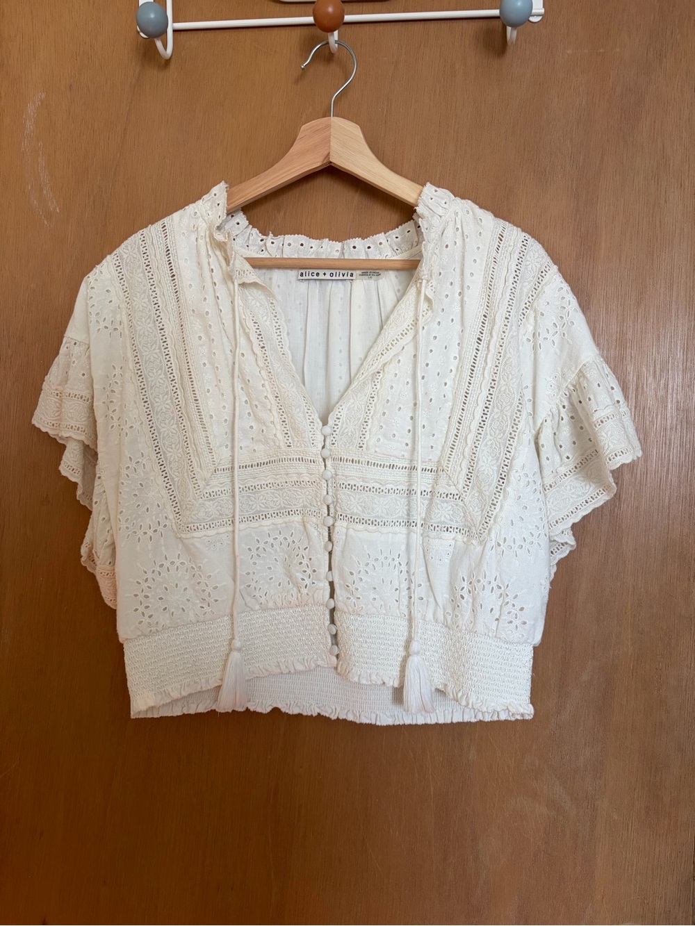 Alice + Olivia Cream Eyelet Crochet Button-Front Blouse with Tassel Ties